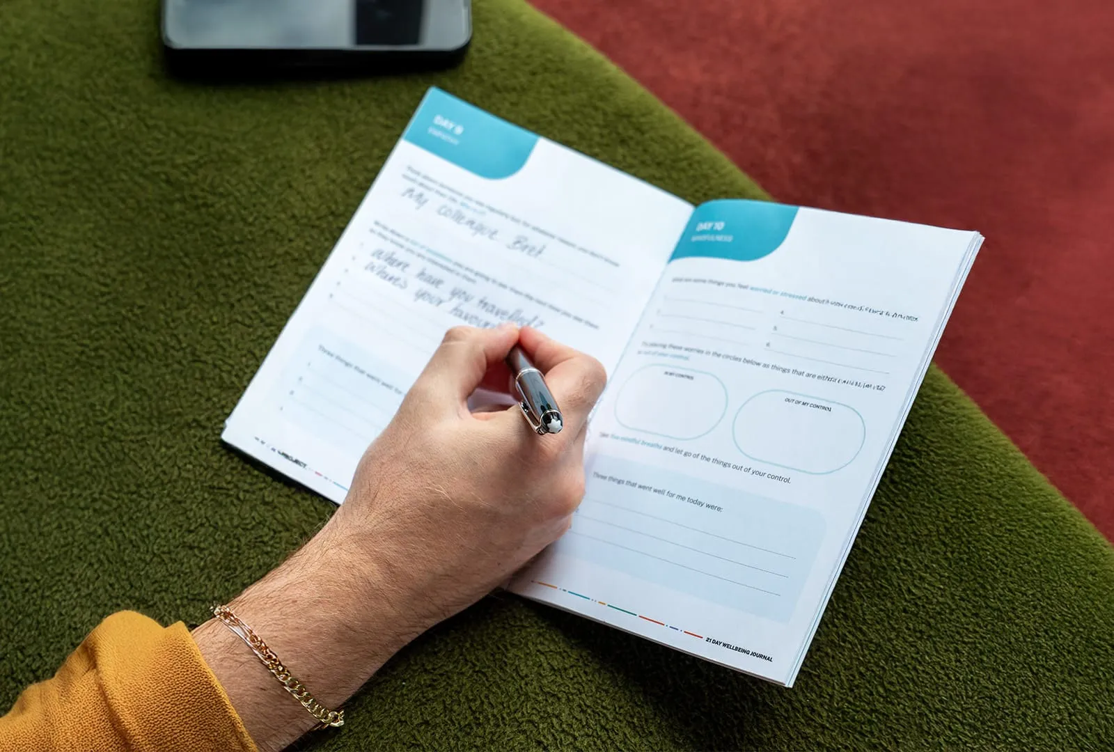 A Resilience Project journal being filled in